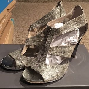 Michael Kors New without box size 8 silver heels
